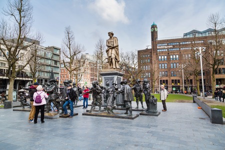 Amsterdam, Netherlands - March 31, 2016: Tourists posing for photo near Night Watch by Rembrandt in Rembrandtplein, Amsterdam, Netherlandsのeditorial素材