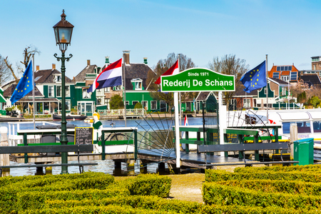 Zaanse schans, Netherlands - April 1, 2016: Panorama with boat pier in Zaanse Schans in Netherlands, Holland near Amsterdamのeditorial素材