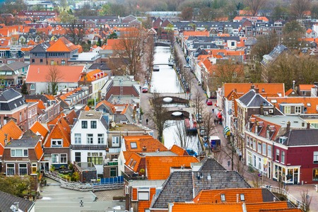 Delft, Netherlands - April 8, 2016: Aerial panoramic downtown street view with canal and houses in Delft, Hollandのeditorial素材