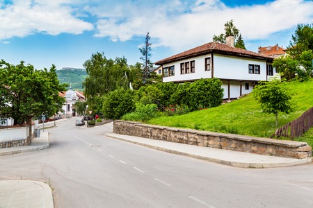 Belogradchik, Bulgaria - May 31, 2016: Vibrant image of Belogradchik, Bulgaria town scenery with old houses and street viewのeditorial素材