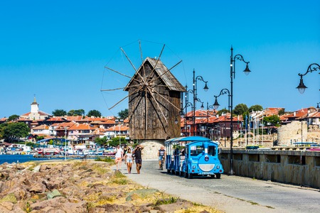Nessebar, Bulgaria - July 25, 2016: Tourist train near old windmill in Nesebar in Bulgariaのeditorial素材