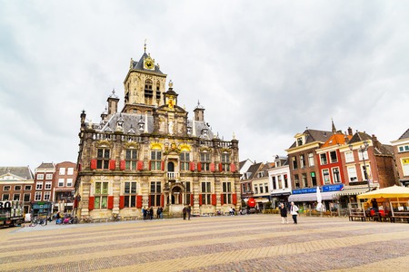 Delft, Netherlands - April 8, 2016: Stadhuis or City Hall, Markt square, houses and people in Delft, Hollandのeditorial素材