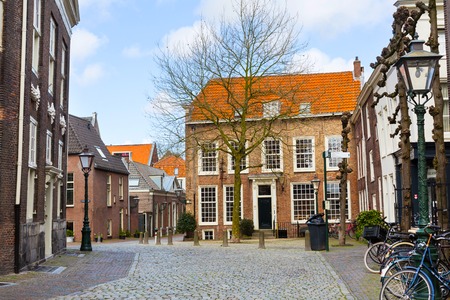 Leiden, Netherlands - April 7, 2016: Street view, traditional houses and bicycles in Leiden, Holland, Netherlandsのeditorial素材