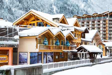 Chamonix, France - January , 30, 2015: Traditional wooden alpine chalet with cafe, restaurant in the...