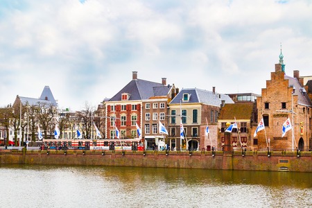 Hague, Netherlands - April 5, 2016: Street view with dutch houses and lake in Hague, Hollandのeditorial素材