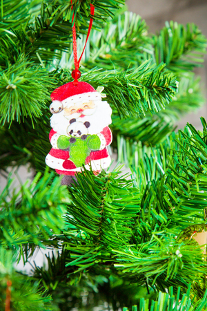 Closeup Santa Claus Christmas tree decoration holiday New year cardの写真素材