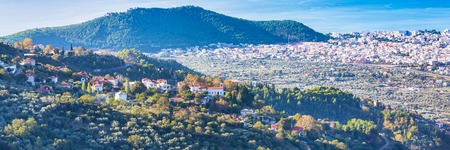 Greek mountain village aerial panoramic banner view with red roof housesの写真素材