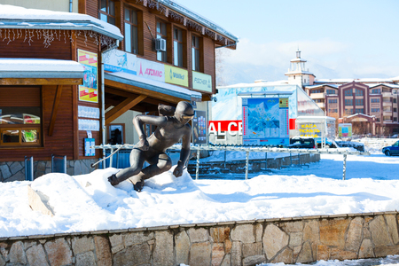 Bansko, Bulgaria - November 30, 2016: Winter ski resort Bansko cable car station and skier statue at the entranceのeditorial素材
