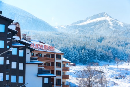 Bansko, Bulgaria - November 30, 2016: St. Ivan Rilski hotel and ski slopes, snow mountains panorama in bulgarian ski resort Banskoのeditorial素材