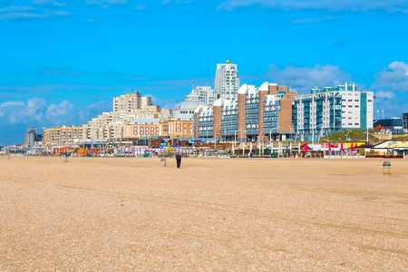 Scheveningen, Netherlands - April 7, 2016: Scheveningen beach panorama with dutch flag, houses near Hague, Hollandのeditorial素材