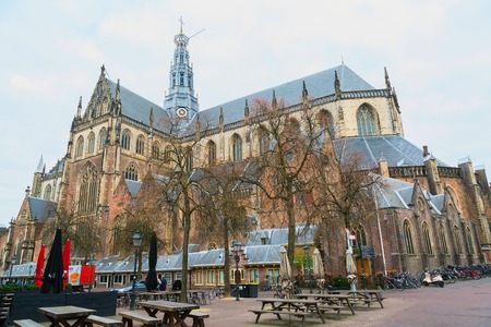 Haarlem, Netherlands - April 2, 2016: Street view with bicycles and cathedral in Haarlem, Hollandのeditorial素材