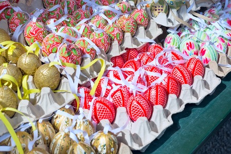 colorful painted easter eggs in basket at the traditional European market