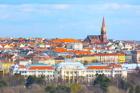 Vienna panoramic skyline with church tower and red roofs, Austriaの写真素材
