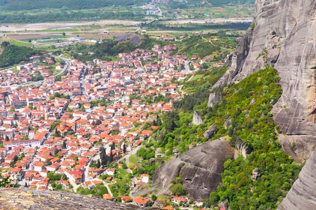 Aerial view of Meteora cliff rock in Greece and traditional greek Kalambaka townの写真素材
