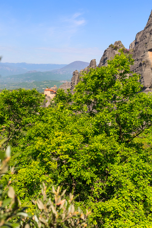 Meteora monastery on the high cliff rock and mountains at spring time, Greeceの写真素材
