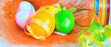 Easter banner background with easter eggs and ribbonsの写真素材