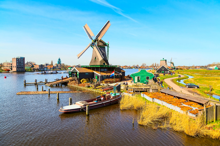 Windmills panorama in Zaanse Schans, traditional village, blue skyの写真素材