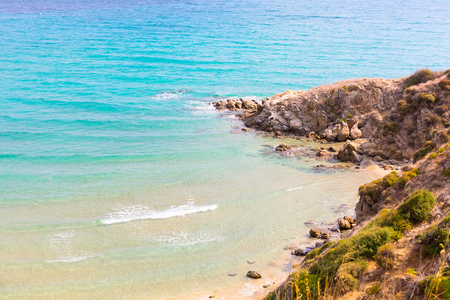 Summer beach vacation background with turquoise sea water wavesの写真素材