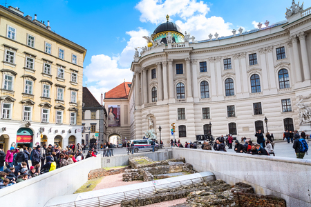 Vienna, Austria - April 3, 2015: Michaelerplatz in Vienna and people looking at the medieval ruinsのeditorial素材