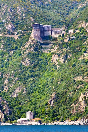 monastery high on the mountain at Athos, Halkidiki , Greece. View from the seaの写真素材