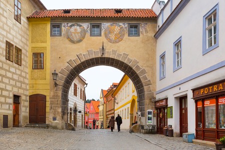 Cesky Krumlov, Czech Republic - February 26, 2017: Famous landmark, historic center street view with archのeditorial素材