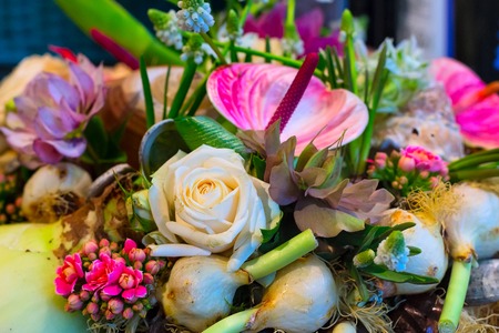 Flower holiday decoration, beautiful lily and roses blooming bouquetの写真素材