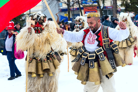 Razlog, Bulgaria - January 14, 2017: People in traditional carnival kuker costumes at Kukeri festival Starchevataのeditorial素材