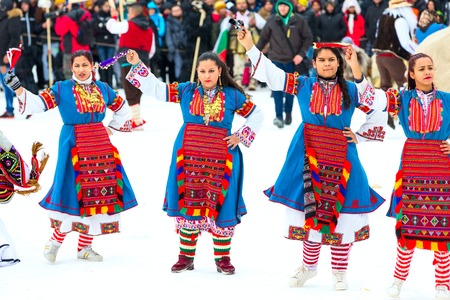 Razlog, Bulgaria - January 14, 2017: Ladies dancing in balkan traditional clothing at the festivalのeditorial素材