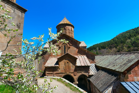 Sapara orthodox monastery church and spring flower tree blossom, Akhaltsikhe, Georgiaの写真素材