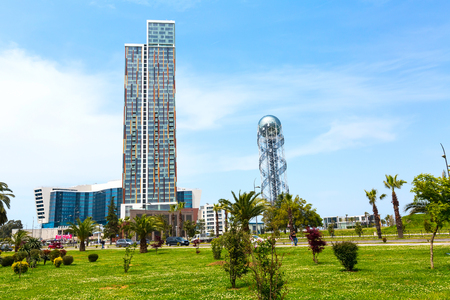 Batumi, Georgia - May 2, 2017: City view with nice modern high buildings, street with palm trees at summer Black sea resortのeditorial素材