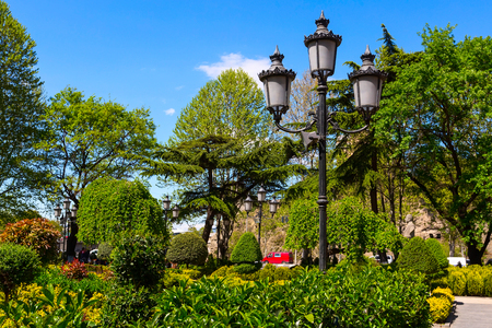 Green park near sulphur baths in old town of Tbilisi, Georgia and street lightの写真素材