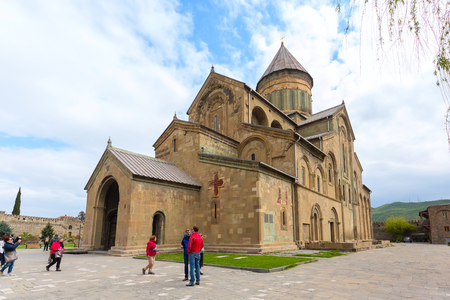 Mtskheta, Georgia - April 28, 2017: Peole near Svetitskhoveli Cathedral located in the historical...