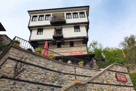 Melnik, Bulgaria - May 11, 2017: Street view with traditional bulgarian house with terrace from the Revival period in Melnik town, Bulgariaのeditorial素材