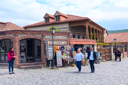 Mtskheta, Georgia - April 28, 2017: Street view with gift souvenir shops in old historical landmark townのeditorial素材