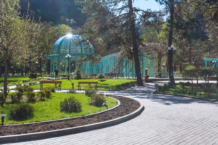 Borjomi, Georgia - April 27, 2017: Green park and Borjomi hot water spring view in georgian spa resortのeditorial素材