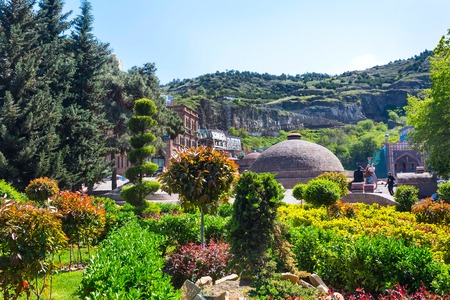Tbilisi, Georgia - April 24, 2017: Abanotubani, Sulfur Bath in old town of Tbilisi and part of the green parkのeditorial素材