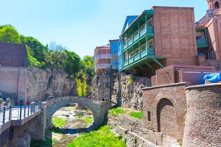 Tbilisi, Georgia - April 24, 2017: Sulphur baths, bridge and traditional houses in Old Town of Tbilisiのeditorial素材