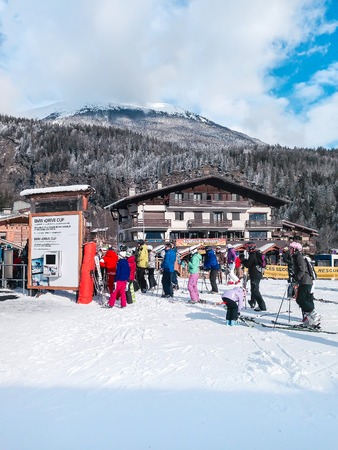 Chamonix, France - January 24, 2015: People near ski lift and slopes in the mountains of winter resort, French Alpsのeditorial素材