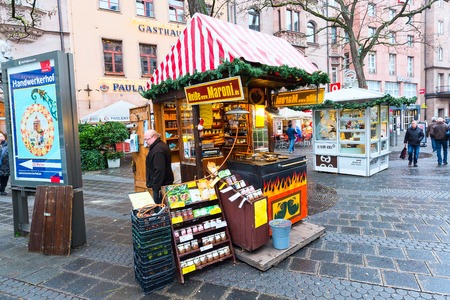 Nuremberg, Germany - December 24, 2016: Christmas market with kiosks and stalls, people in Nuremberg Bavariaのeditorial素材