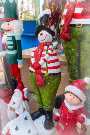 Closeup snowman in red scarf at traditional christmas marketの写真素材