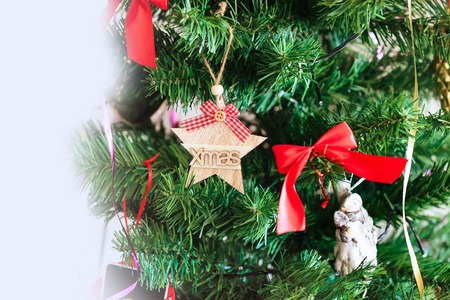 Christmas or New Year background with green christmas tree branch, decorations with copy space