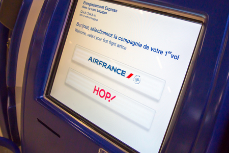 Geneva, Switzerland - January 31, 2015: Air france and hop self check-in kiosk display at the airport of Genevaのeditorial素材