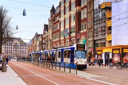 Amsterdam, Netherlands - March 31, 2016: Street view and tram in city centre of Amsterdam, Hollandのeditorial素材
