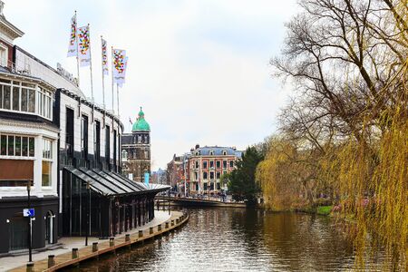 Amsterdam, Netherlands - March 31, 2016: Street view and canal in city centre of Amsterdam, Hollandのeditorial素材