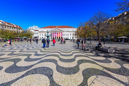 Lisbon, Portugal - March 27, 2018: Rossio square with fountain and peopleのeditorial素材