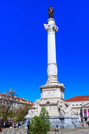 Lisbon, Portugal - March 27, 2018: Rossio square with people and column statue of Dom Pedro IVのeditorial素材