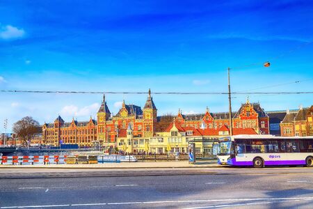 Amsterdam, Netherlands - April 2, 2016: Railway station and GVB bus in Amsterdam, Hollandのeditorial素材