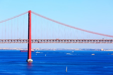 Lisbon, Portugal landmark Ponte de 25th Abril bridge and River Tagus panoramaの写真素材