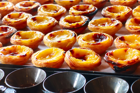 Rows of egg tart, traditional portuguese dessert, pastel de nata, custard tarts