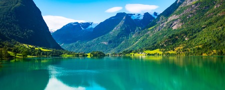 Norway Nordfjord fjord panoramic banner with glacier, forest mountains landscape and rural houses. Norwegian natureの写真素材